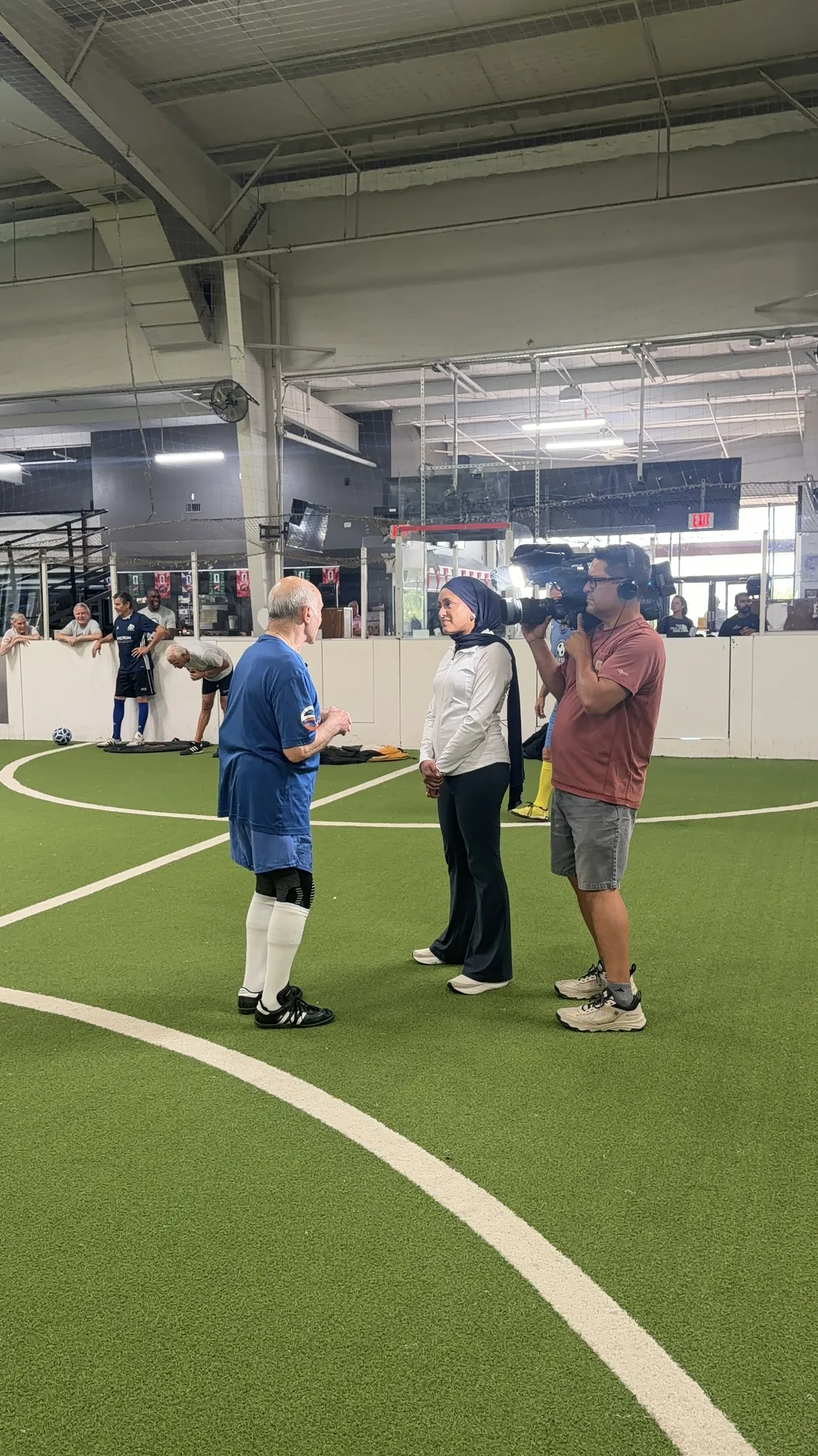 News crew filming at Soccer Spectrum